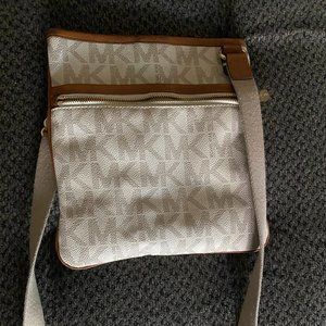 Michael Kors Crossbody - Logo Messenger Bag printed with MK iconic initials